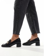 heeled loafers in black patent