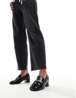 heeled loafers in black patent