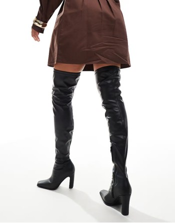 Acquaria over the knee boots in black