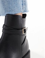 Aria flat chelsea boots with buckle detail in black