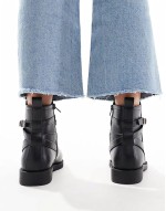 Aria flat chelsea boots with buckle detail in black