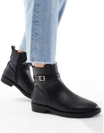 Aria flat chelsea boots with buckle detail in black