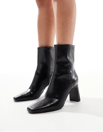 Reach set back mid heel boots in black