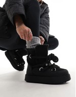 Alpine shearling lace up snow boots in black