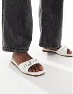 60% New Celini flat sandals in white patent